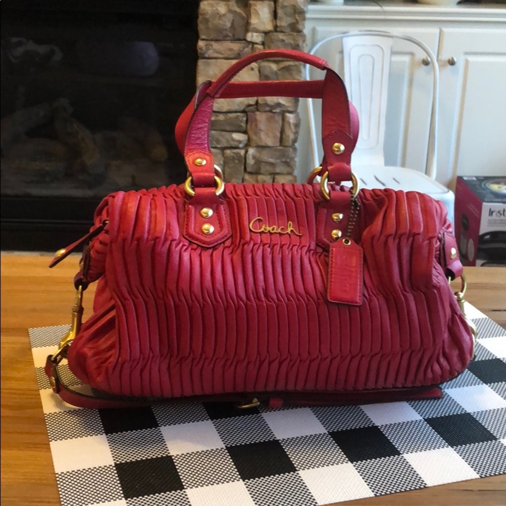 Excellent condition fuchsia colored Coach handbag